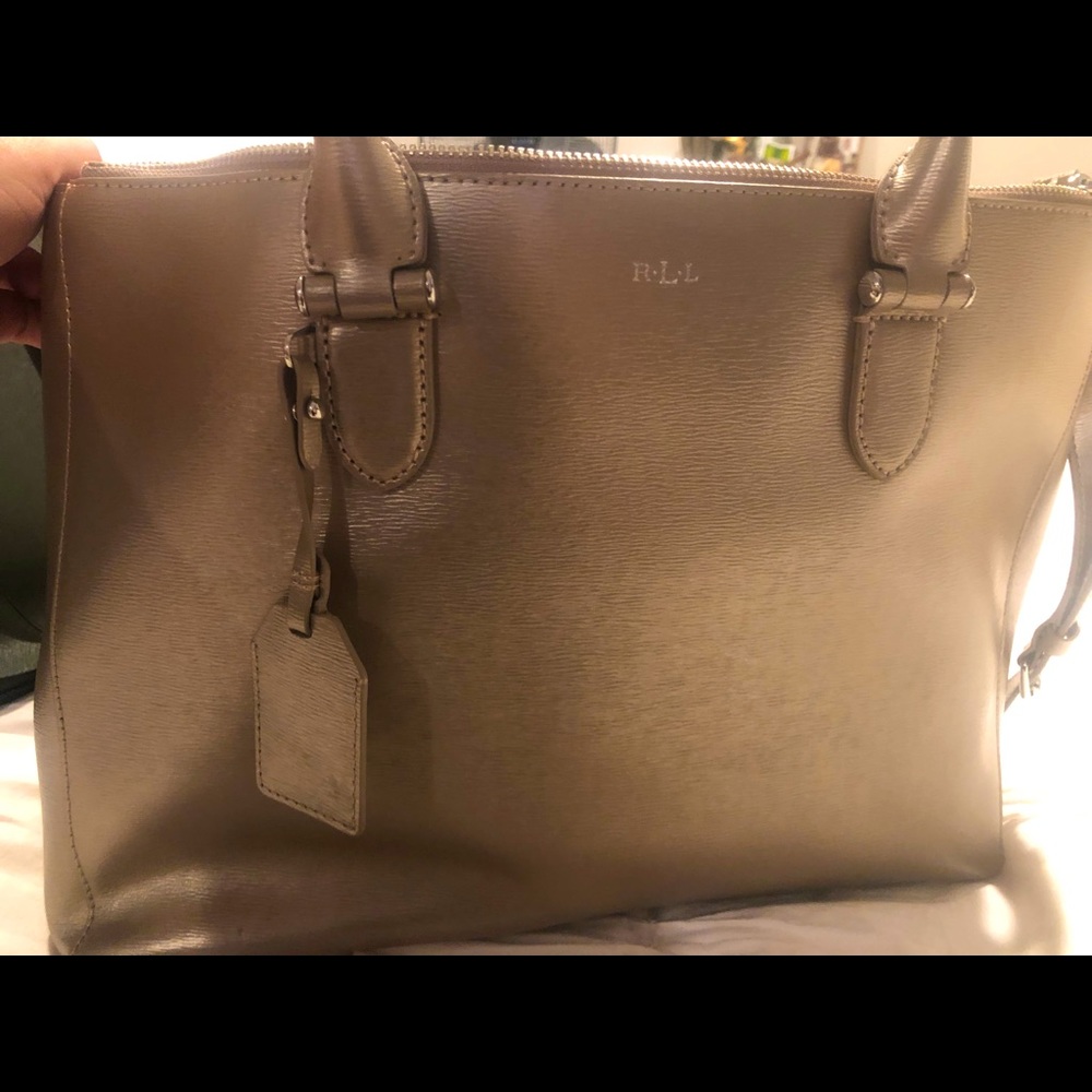 Purse with 2 zipper sections.  Only used once for a wedding.